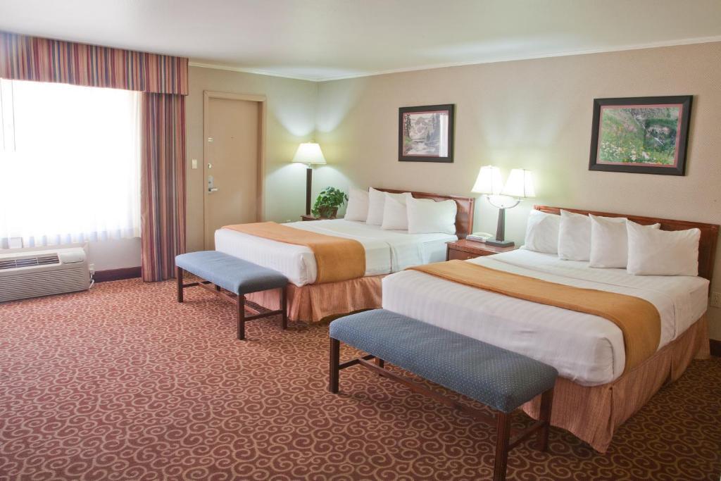 Red Arrow Inn & Suites, A Travelodge By Wyndham Montrose Habitación foto